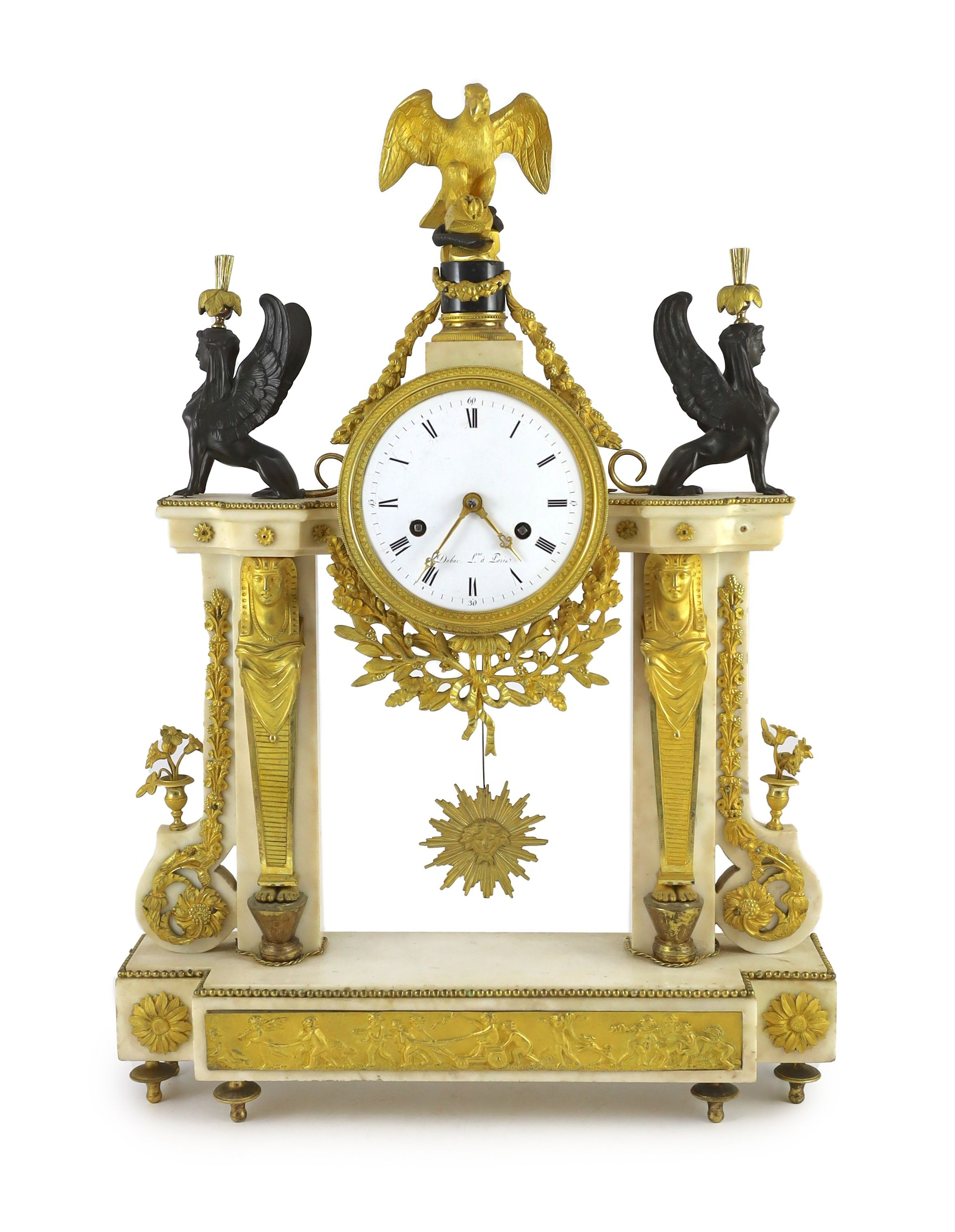 Jean Baptiste Dubuc L'ne à Paris. A Louis XVI bronze and ormolu mounted white marble mantel clock, width 43cm, depth 11cm, height 60cm